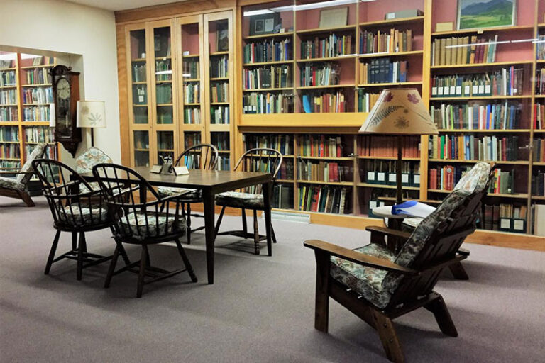 Saranac Lake Free Library downstairs research room with table and chairs 768x512