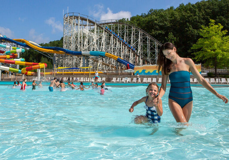 Six Flags Great Escape Hurricane Bay woman with girl in wave pool 768x536